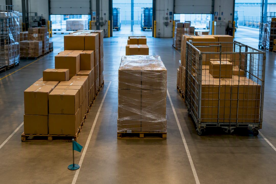 Cross-border freight staged across outbound lanes